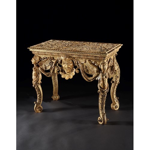 AN IMPORTANT QUEEN ANNE GILTWOOD AND GESSO TABLE TO A DESIGN BY DANIEL MAROT